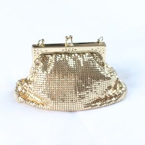 This gorgeous vintage gold clutch is so precious
